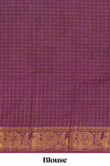Bottle green Chettinad cotton saree with checked body contrasting peacock zari border striped pallu and blouse