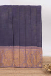 Dark blue Chettinad cotton saree with checked body contrasting peacock zari border striped pallu and blouse