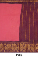 Bright pink sungudi cotton saree with checked body contrasting peacock zari border striped pallu and blouse