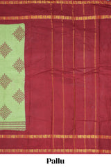 Parrot green traditional kolam print sungudi cotton saree with contrast border and striped pallu
