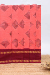 Pink traditional kolam print sungudi cotton saree with contrast border and striped pallu