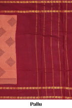 Peach traditional kolam print sungudi cotton saree with contrast border and striped pallu