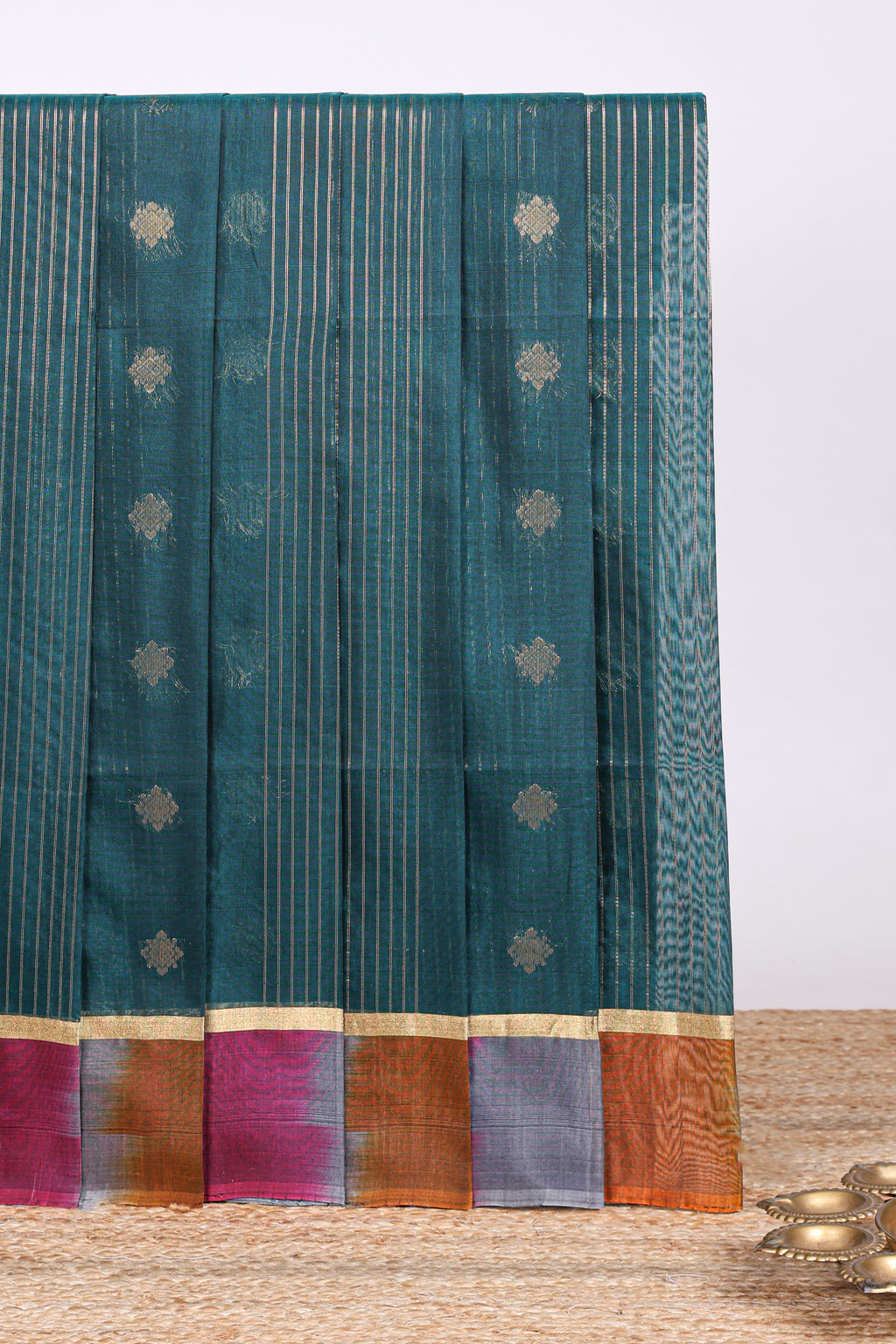 Pine green striped zari motifs design silk cotton saree with contrast zari border and blouse