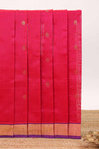 Rani pink butta designed silk cotton saree with contrast zari border and blouse