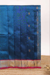 Dark blue butta designed silk cotton saree with contrast zari border and blouse