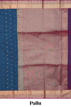 Blue butta designed silk cotton saree with contrast zari border and contrast blouse