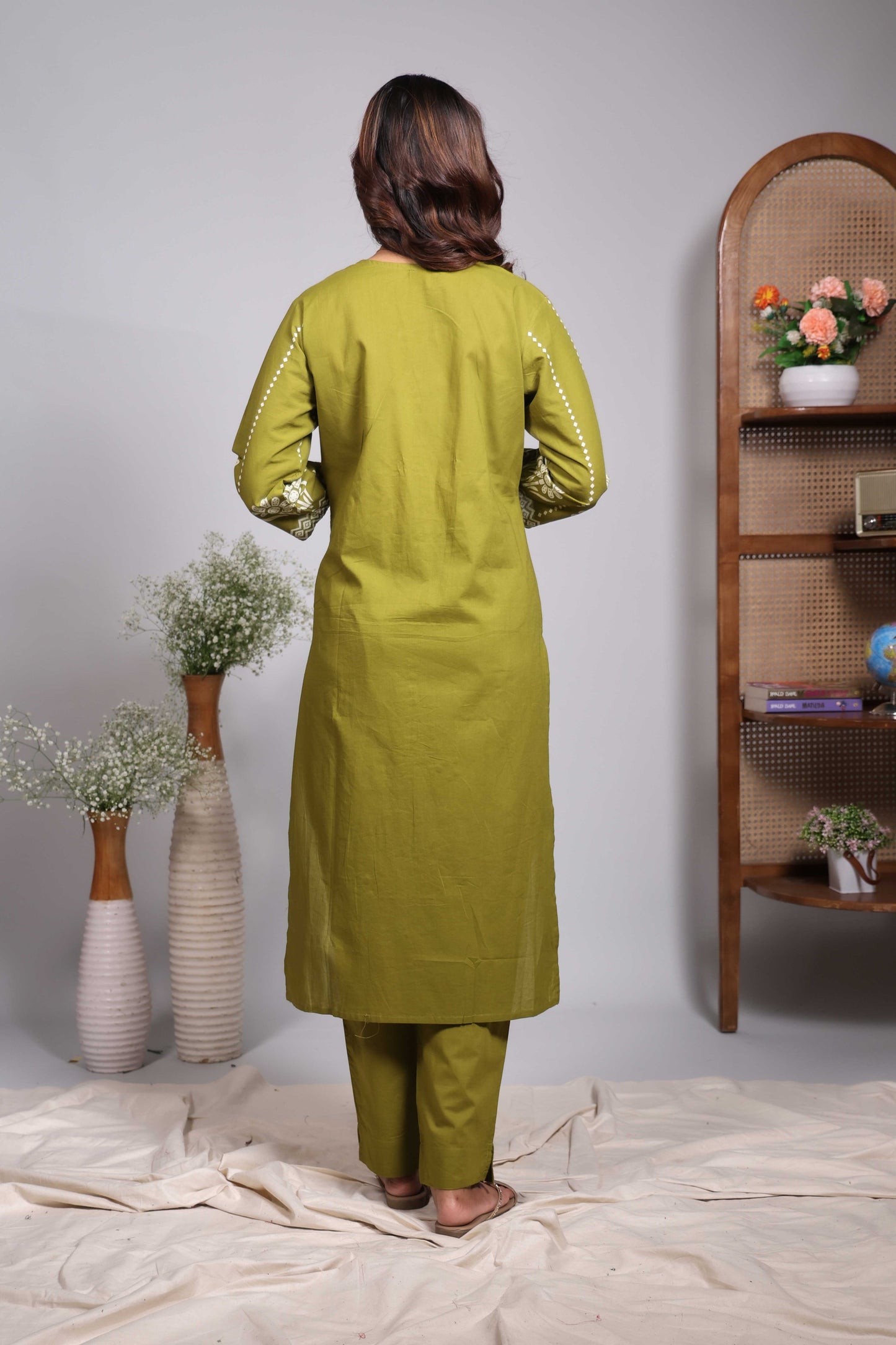 Green striped floral motifs design V neck salwar set with 3/4th sleeve, self bottom and matching dupatta