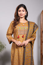 Mustard floral motifs design round neck salwar set with 3/4th sleeve, self bottom and matching dupatta