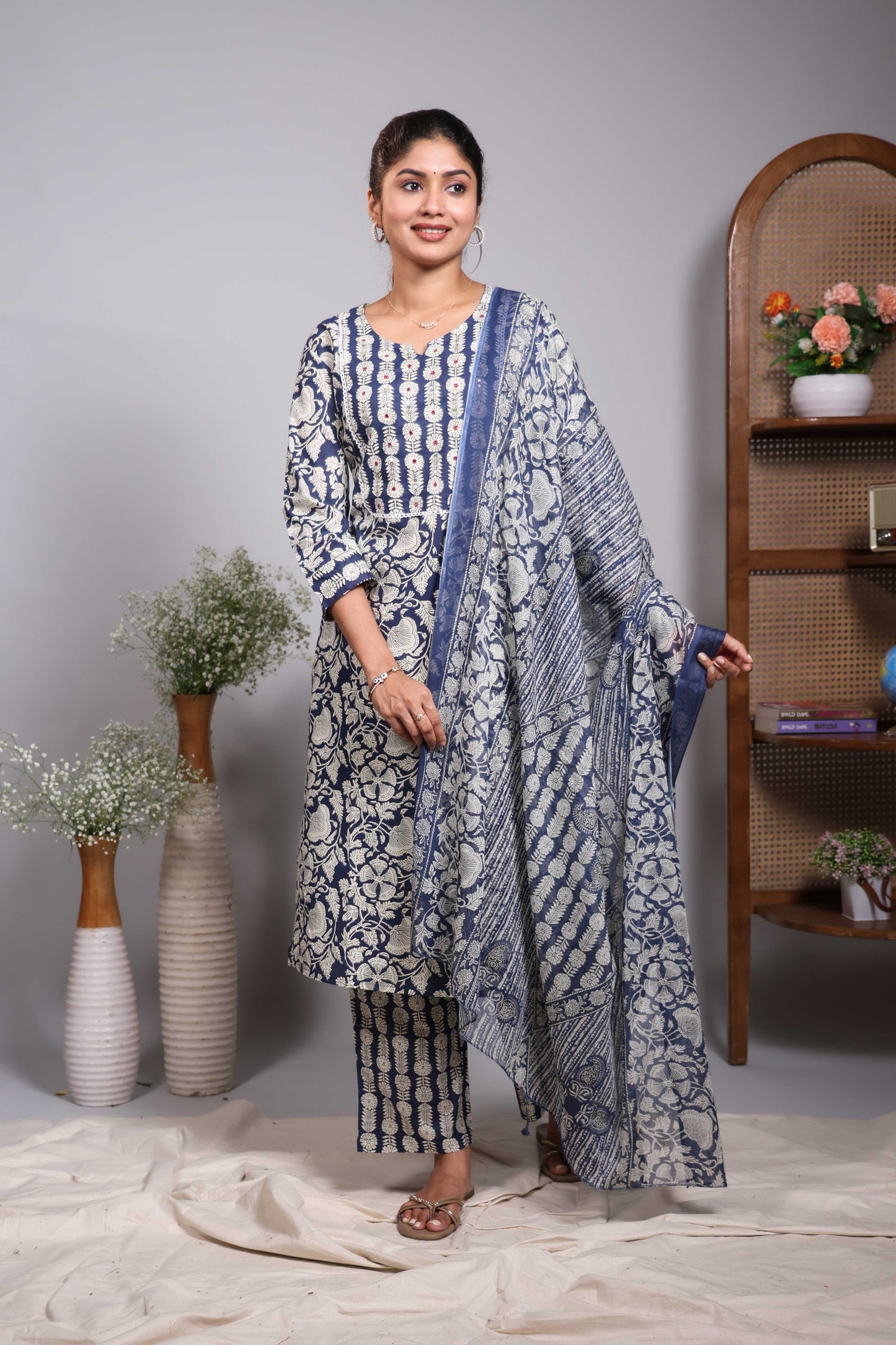 Blue floral design V neck salwar set with 3/4th sleeve, self bottom and matching dupatta