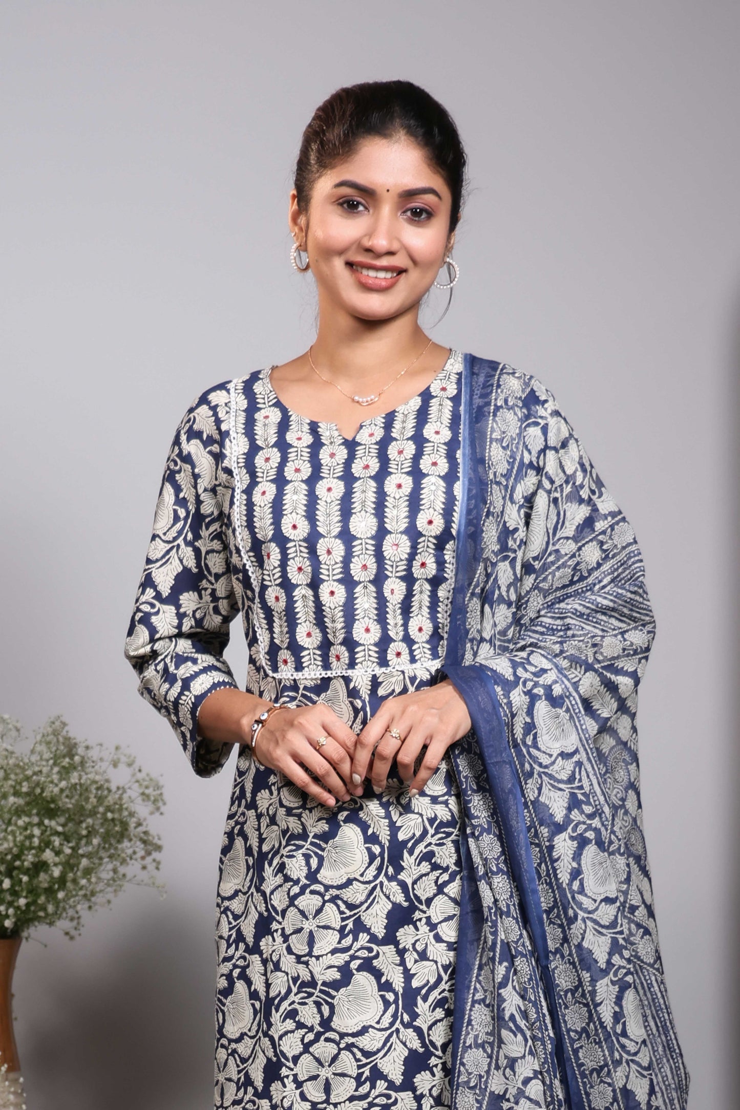 Blue floral design V neck salwar set with 3/4th sleeve, self bottom and matching dupatta