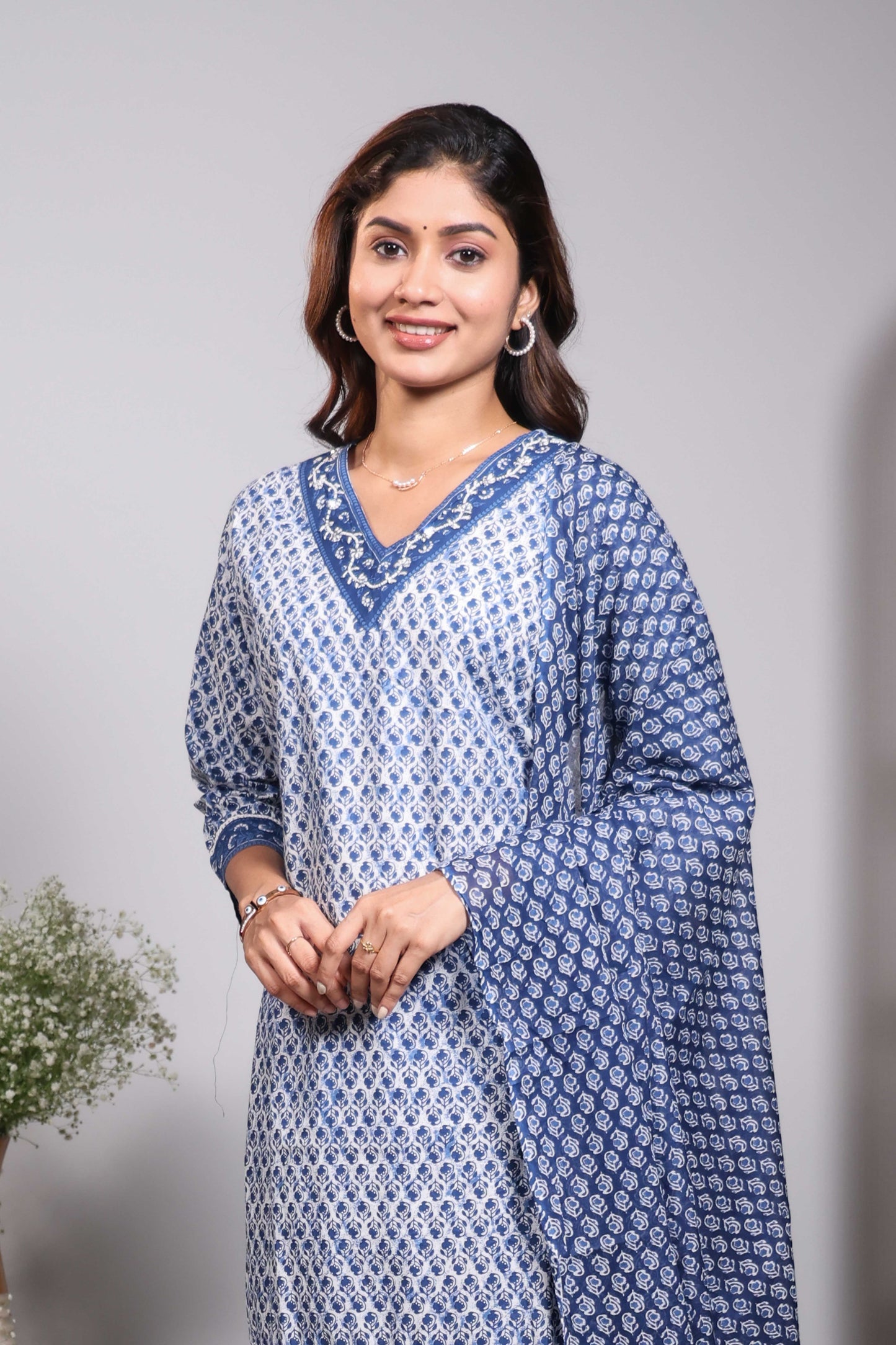 Blue floral design V neck salwar set with 3/4th sleeve, contrast bottom and matching dupatta