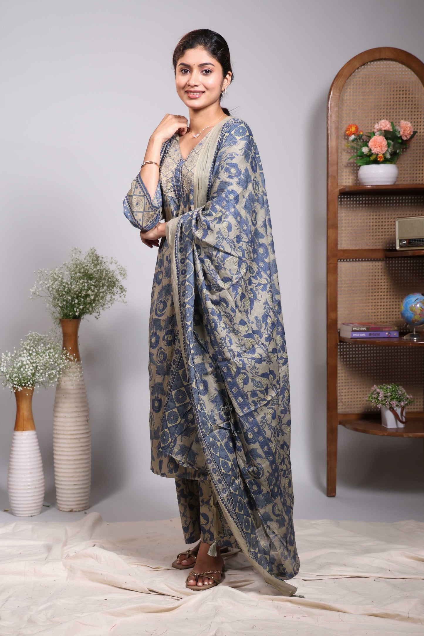 Green floral design V neck salwar set with 3/4th sleeve, self bottom and matching dupatta