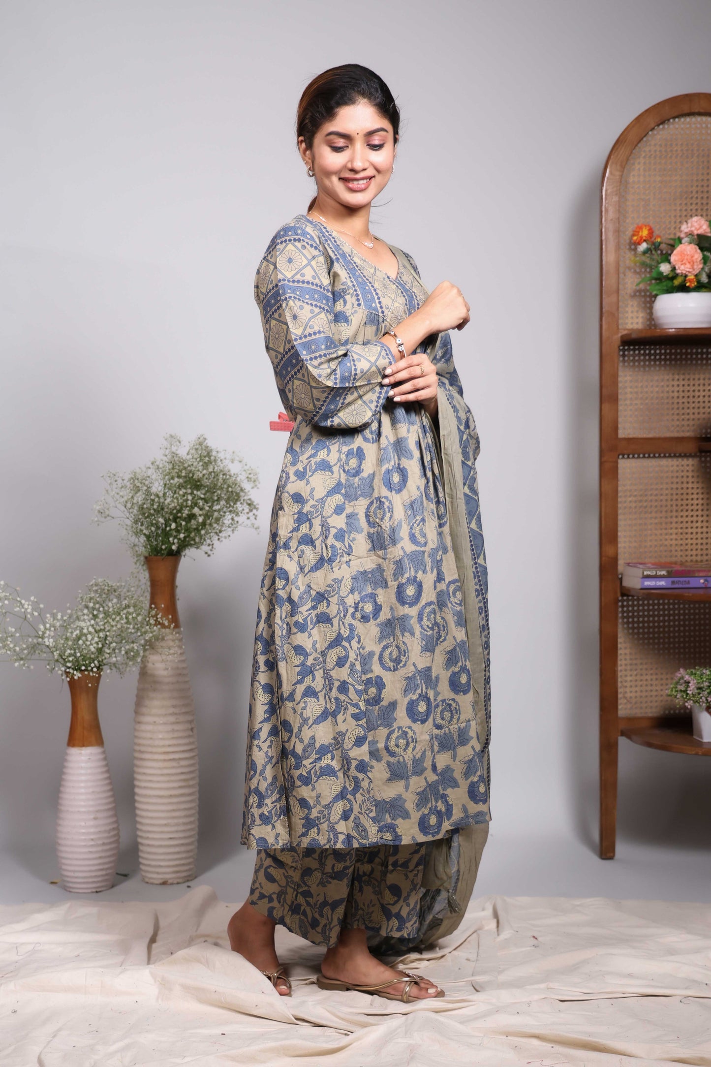 Green floral design V neck salwar set with 3/4th sleeve, self bottom and matching dupatta