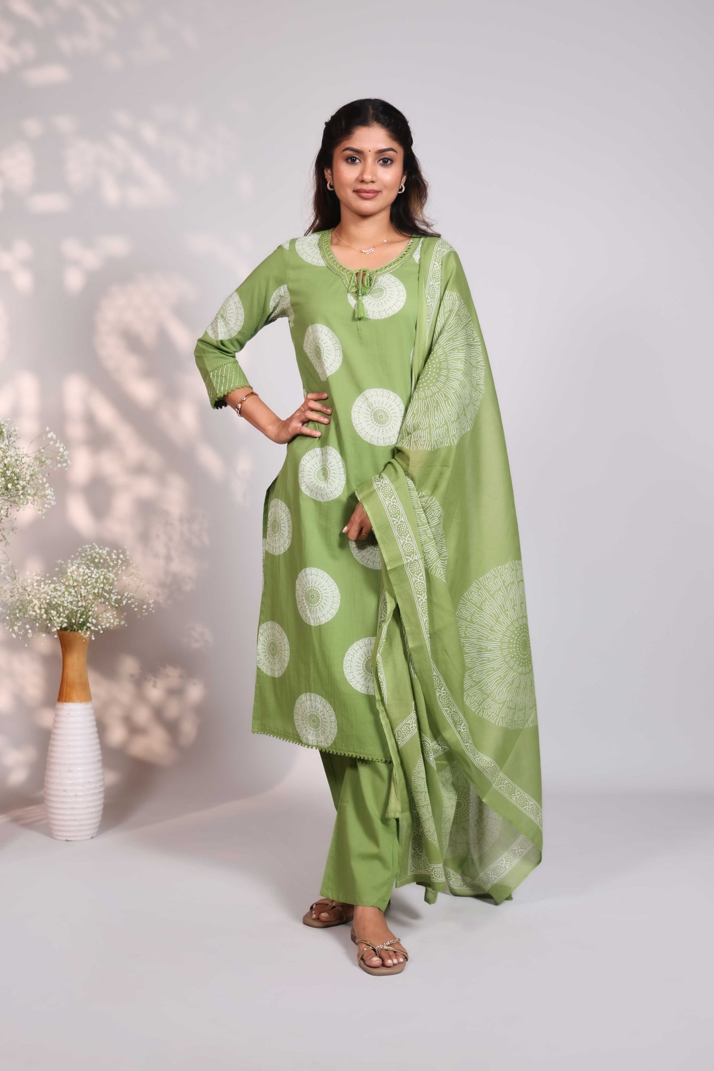 Green mandala circle block design round neck with fine lace salwar set with 3/4th sleeve, self bottom and  matching dupatta