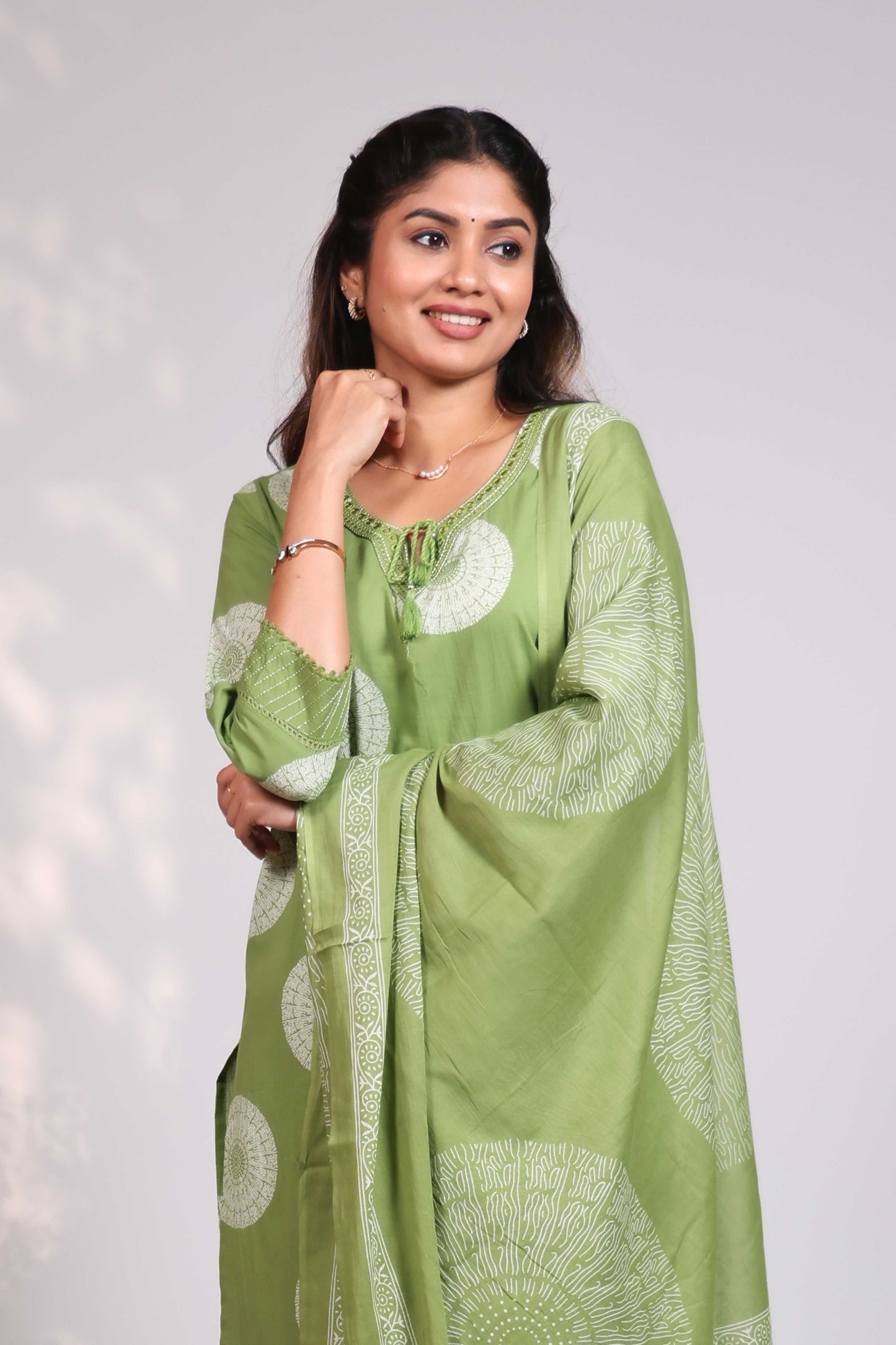 Green mandala circle block design round neck with fine lace salwar set with 3/4th sleeve, self bottom and  matching dupatta