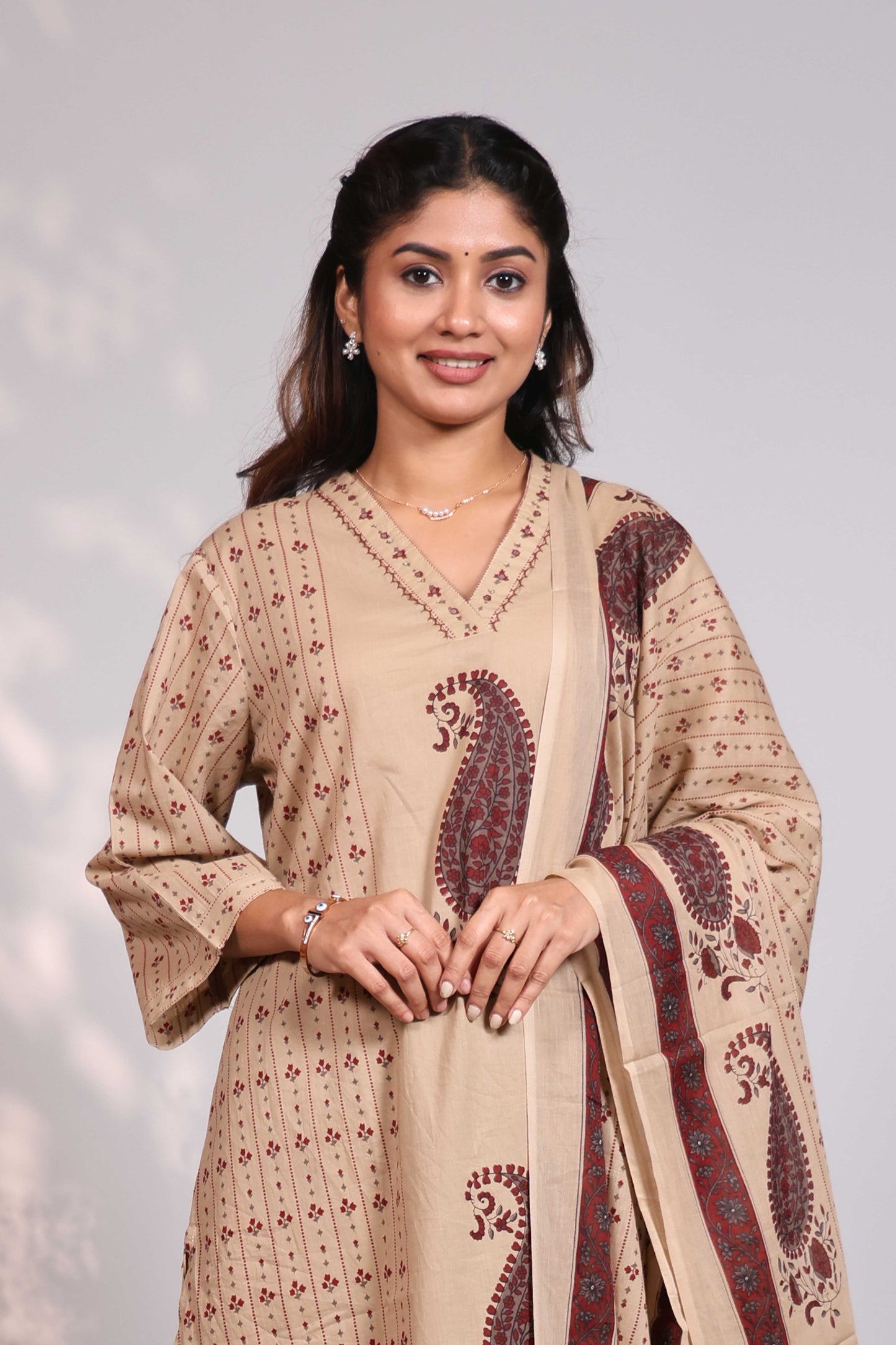 Beige mandala circle block design round neck with fine lace salwar set with 3/4th sleeve, self bottom and  matching dupatta