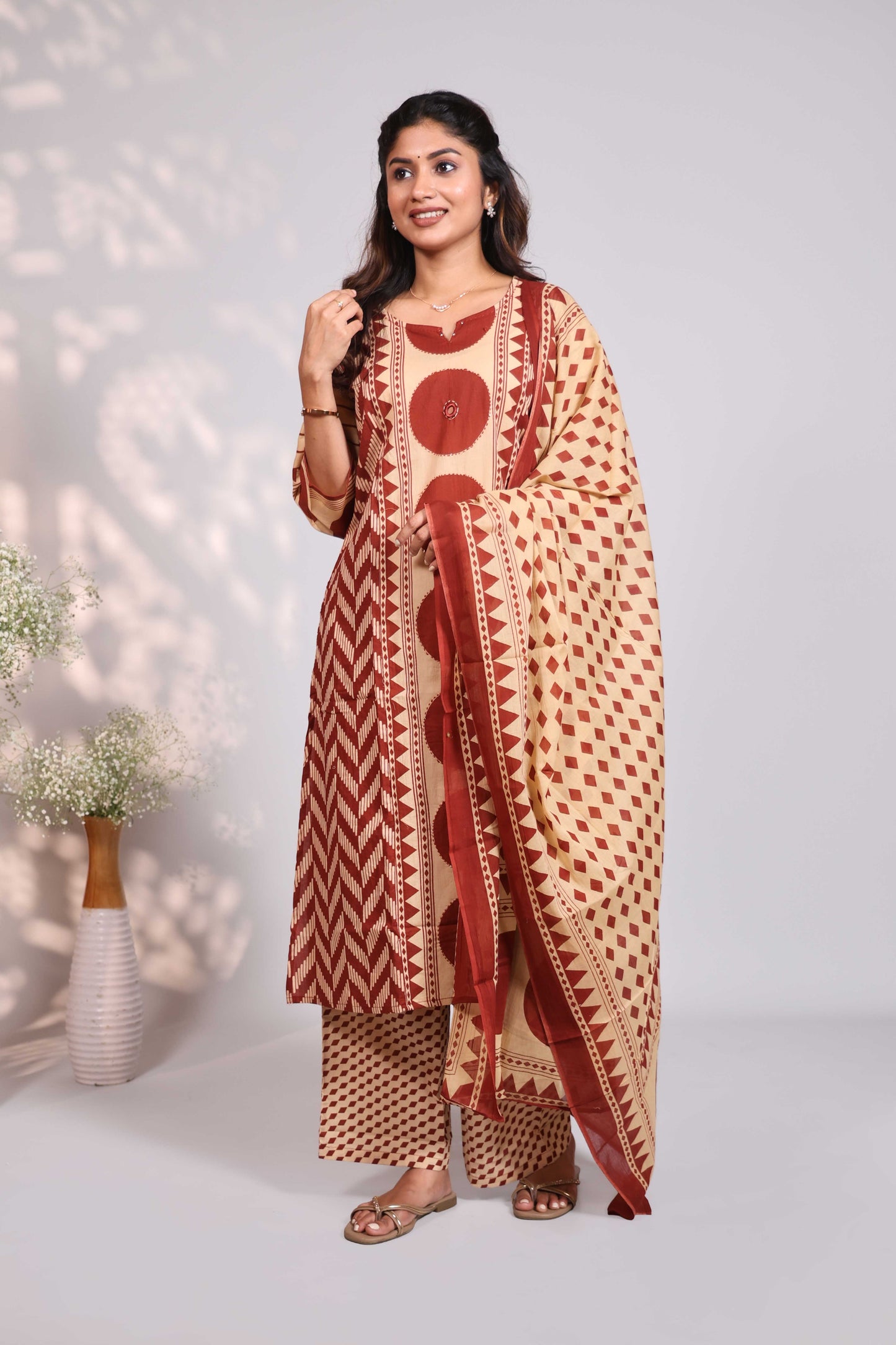 Sandal geometric motifs design round neck salwar set with 3/4th sleeve, self bottom and matching dupatta