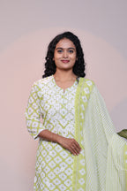 Green floral motifs 3/4 slevee salwar suit with matching pant and printed dupatta