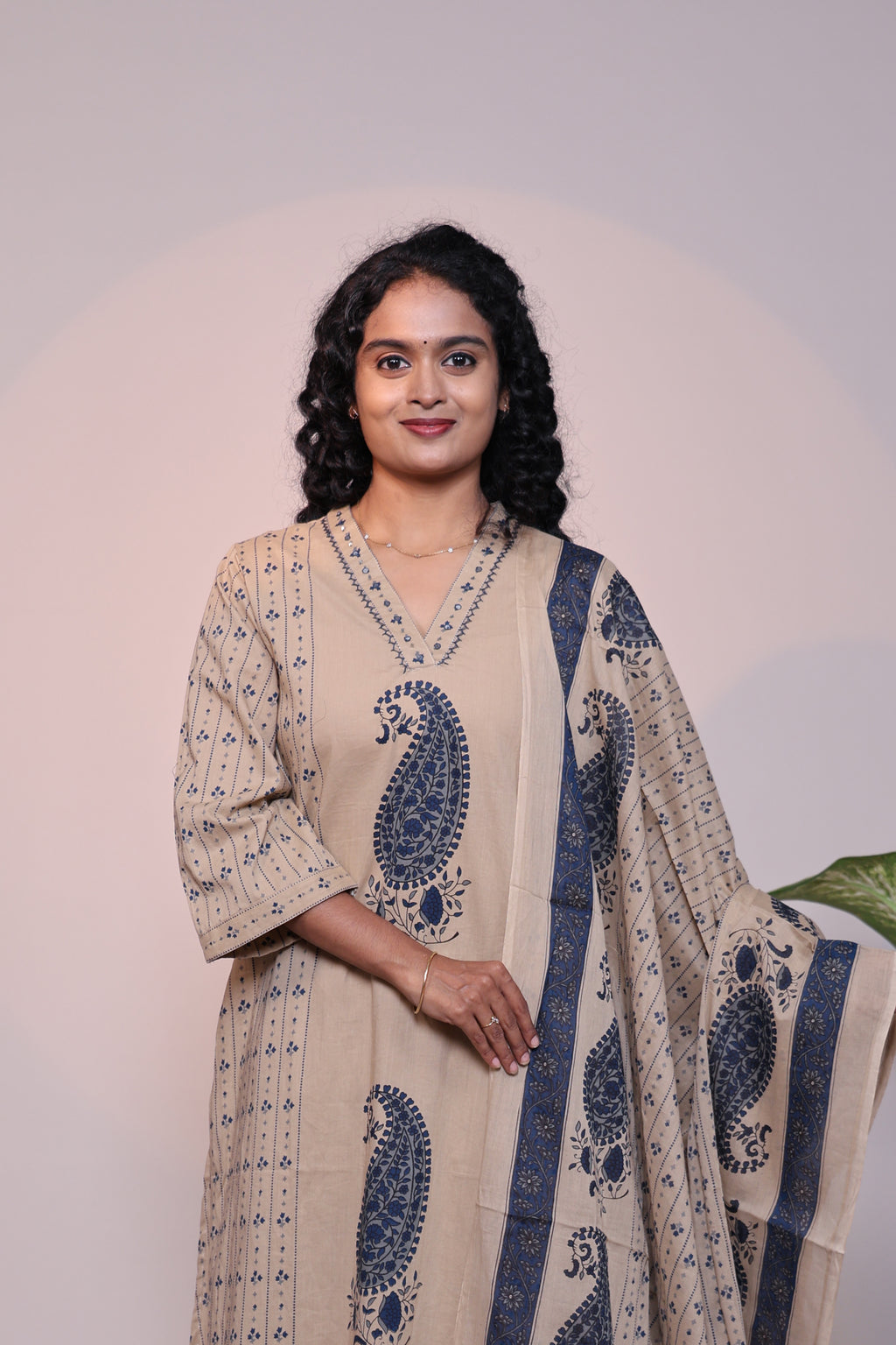 Light brown floral motifs 3/4 slevee salwar suit with matching pant and printed dupatta