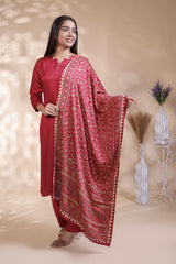 Red plain salwar suit with front star cut neck, 3/4 sleeves and matching bottom