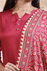 Red plain salwar suit with front star cut neck, 3/4 sleeves and matching bottom