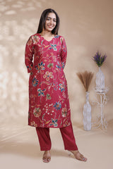Red floral design salwar suit with front V-neck, 3/4 sleeves and matching bottom