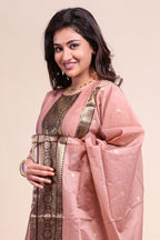 Peach traditional salwar suit with front U-neck, 3/4 sleeves and contrast bottom