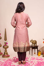 Peach traditional salwar suit with front U-neck, 3/4 sleeves and contrast bottom