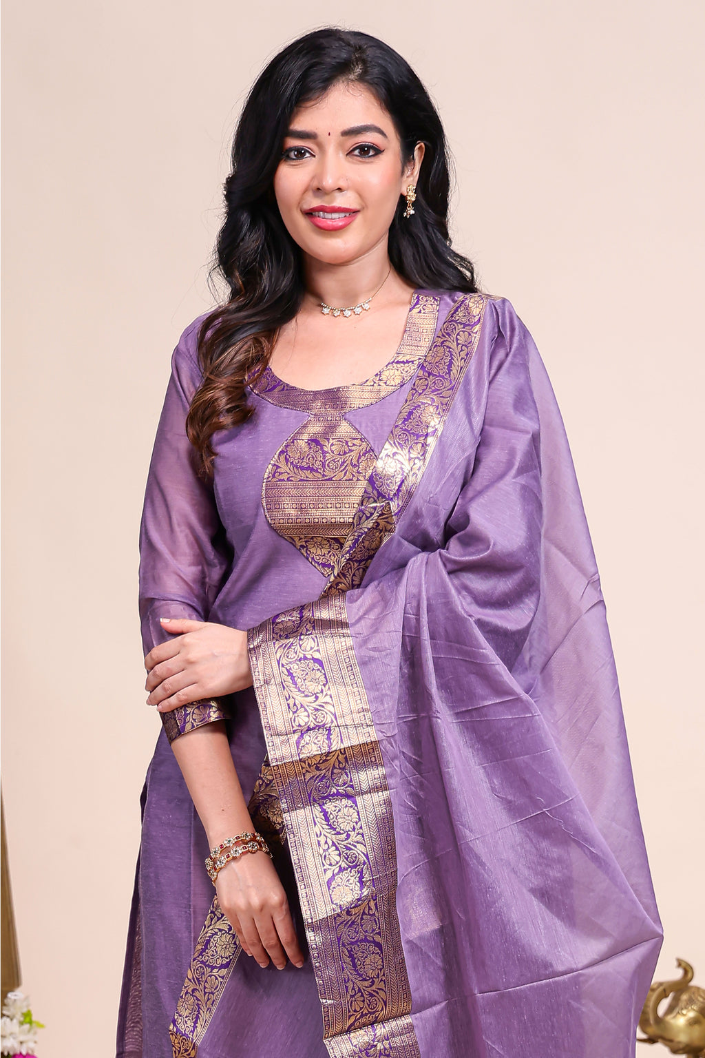 Purple traditional salwar suit with front U-neck, 3/4 sleeves and contrast bottom