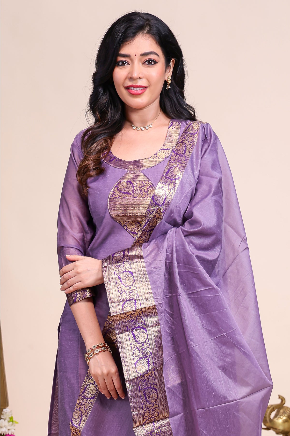 Purple traditional salwar suit with front U-neck, 3/4 sleeves and contrast bottom