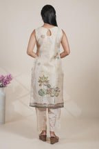 Off white floral designed straight cut kurta set with pant and a shawl