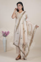 Off white floral designed straight cut kurta set with pant and a shawl
