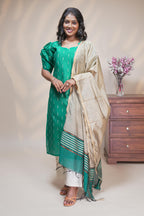 Women emerald green cotton silk straight kurta pant set with tissue dupatta