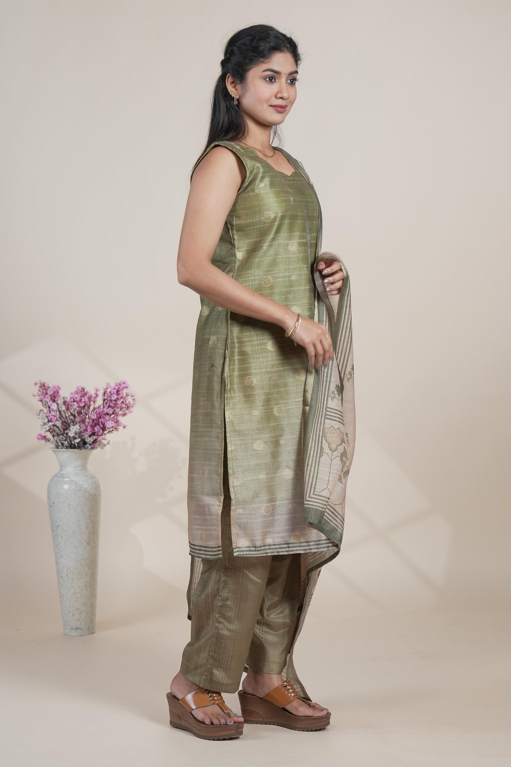 Moss green floral designed straight cut kurta set with pant and a shawl