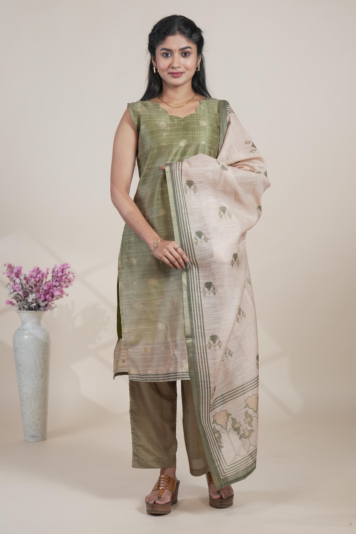 Moss green floral designed straight cut kurta set with pant and a shawl