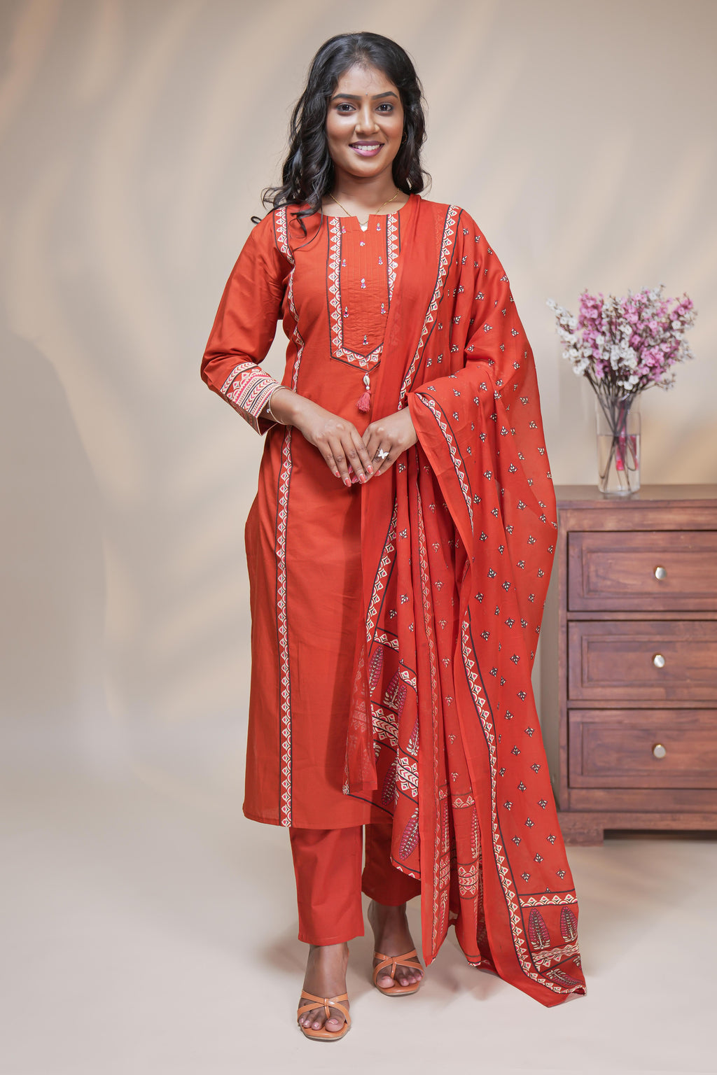 women rust orange cotton straight kurta pant and dupatta set with embroidered yoke