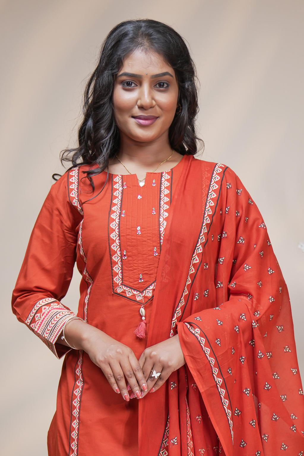 women rust orange cotton straight kurta pant and dupatta set with embroidered yoke
