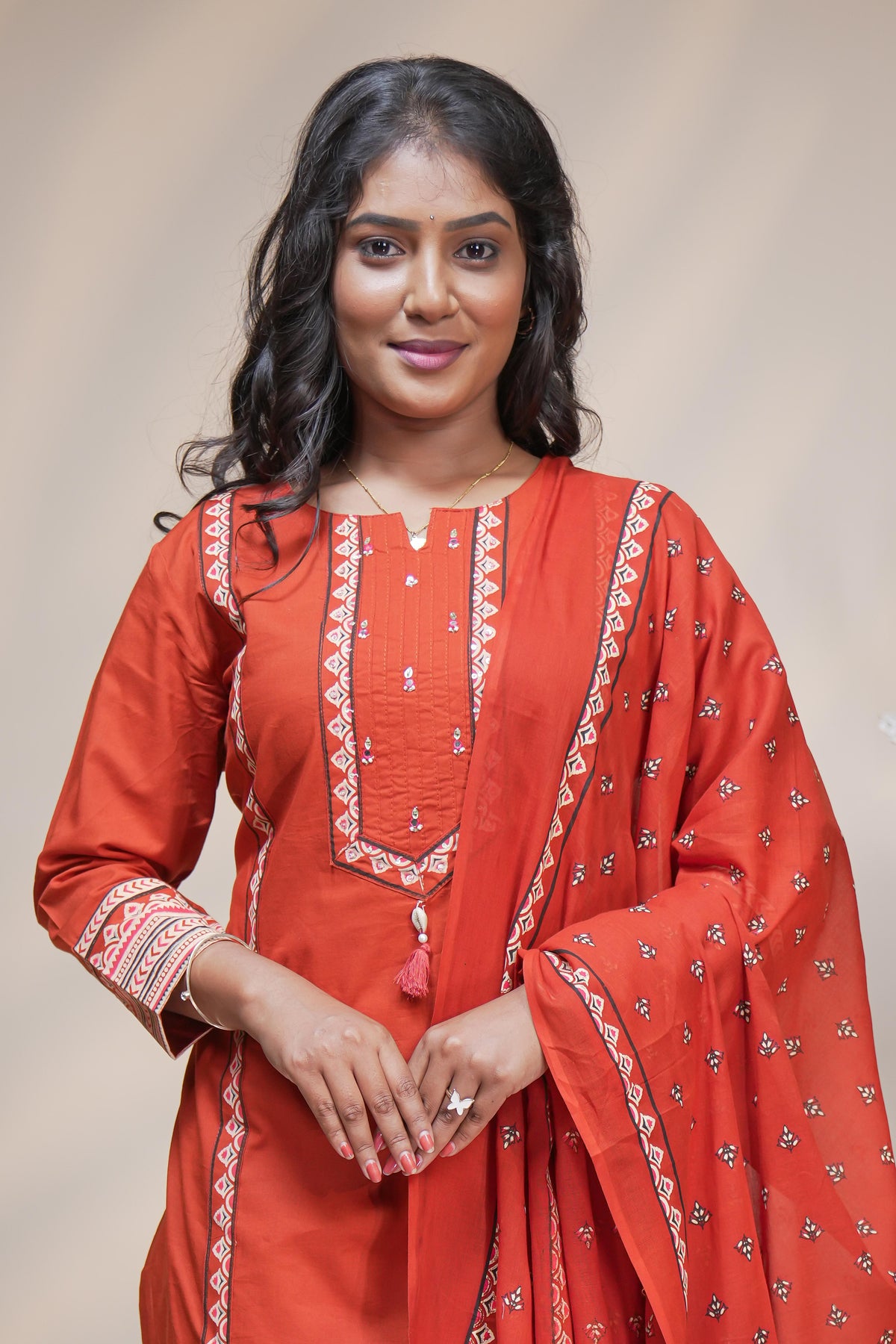 women rust orange cotton straight kurta pant and dupatta set with embroidered yoke