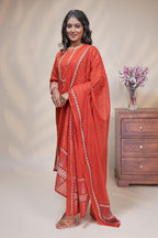 women rust orange cotton straight kurta pant and dupatta set with embroidered yoke