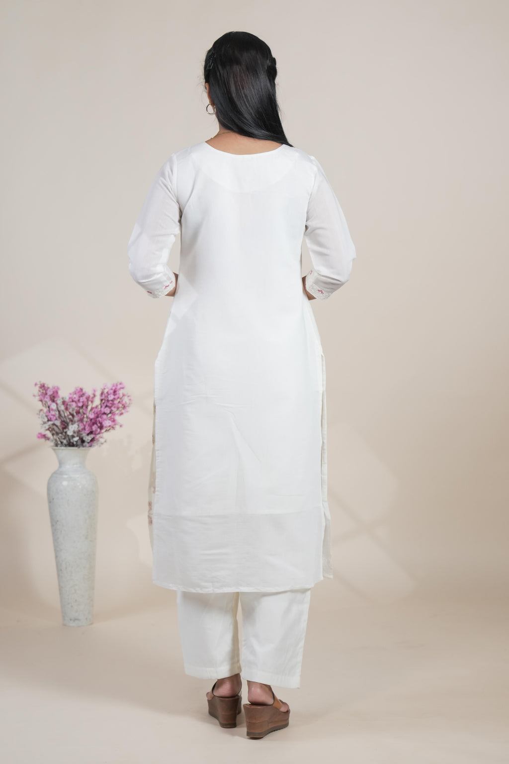 white floral designed straight cut kurta set with 3/4 sleeve and a shawl