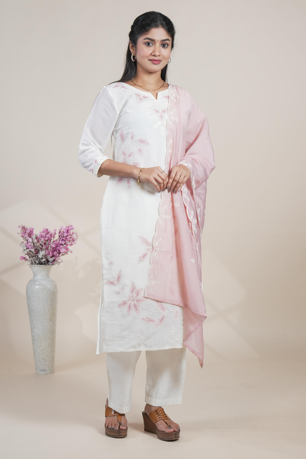white floral designed straight cut kurta set with 3/4 sleeve and a shawl