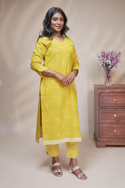 women yellow polka doted straight cotton kurta set with matching pant and dupatta