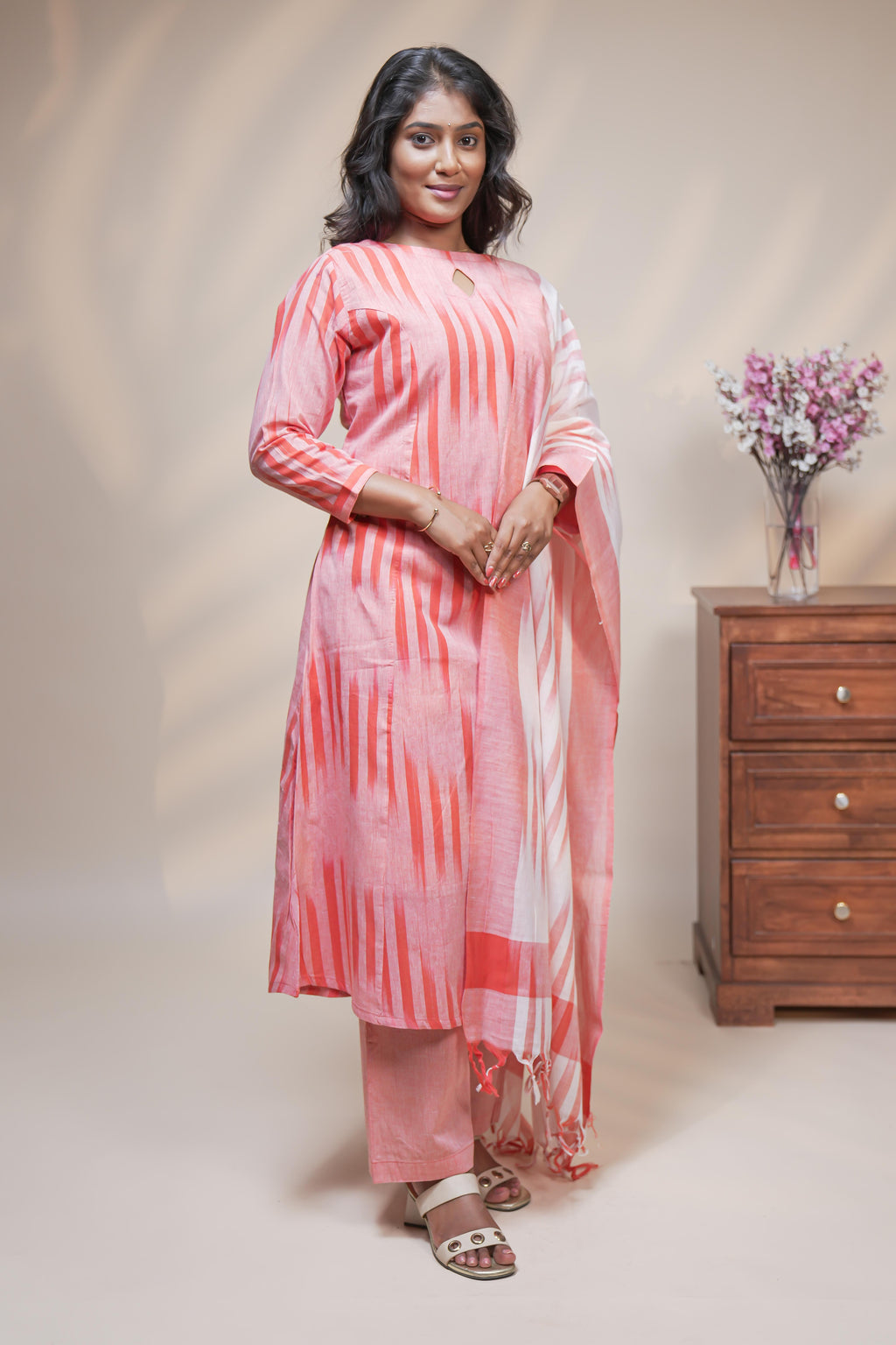 women orange striped straight cotton kurta set with matching pant and dupatta