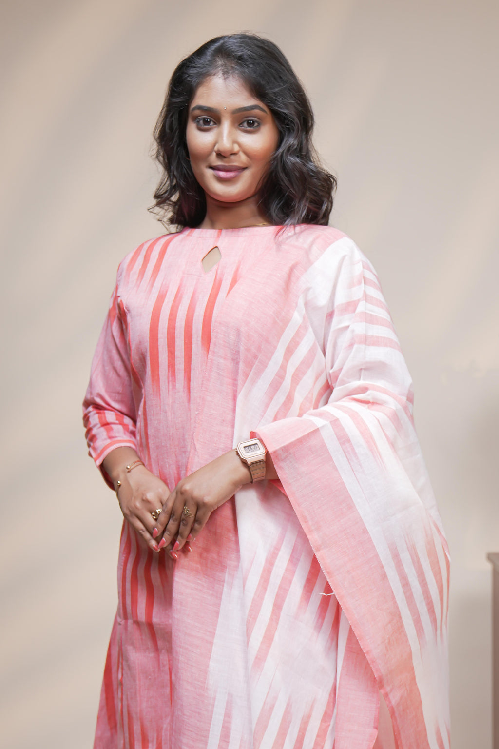 women orange striped straight cotton kurta set with matching pant and dupatta