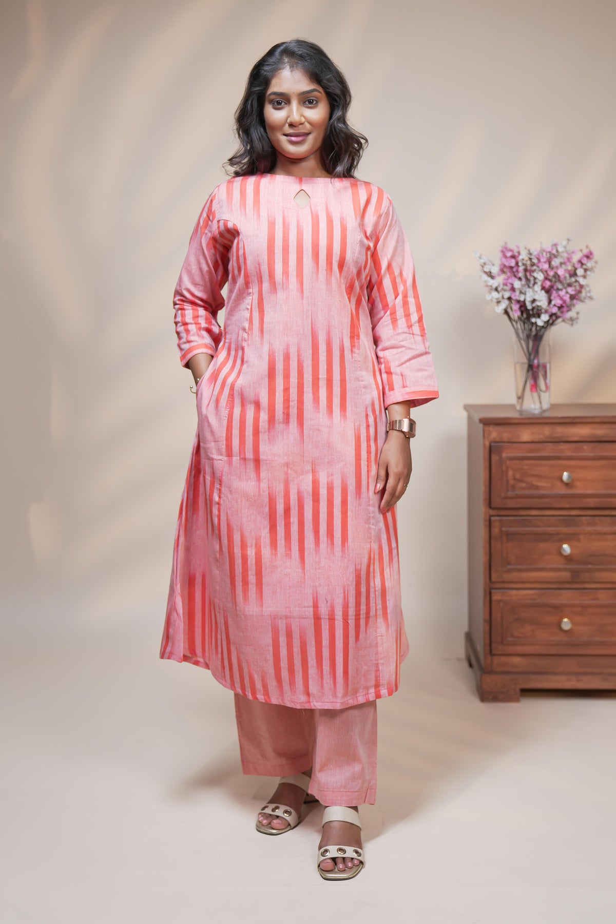 women orange striped straight cotton kurta set with matching pant and dupatta