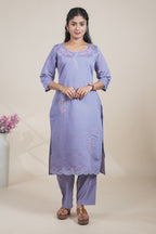 Purple floral designed straight cut kurta set with 3/4 sleeve and a pant