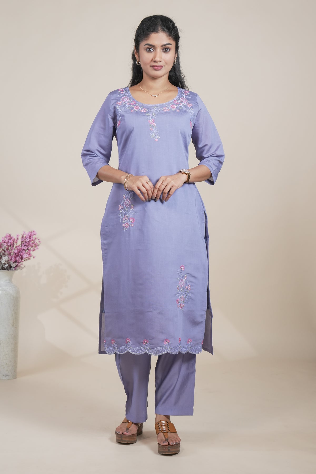 Purple floral designed straight cut kurta set with 3/4 sleeve and a pant