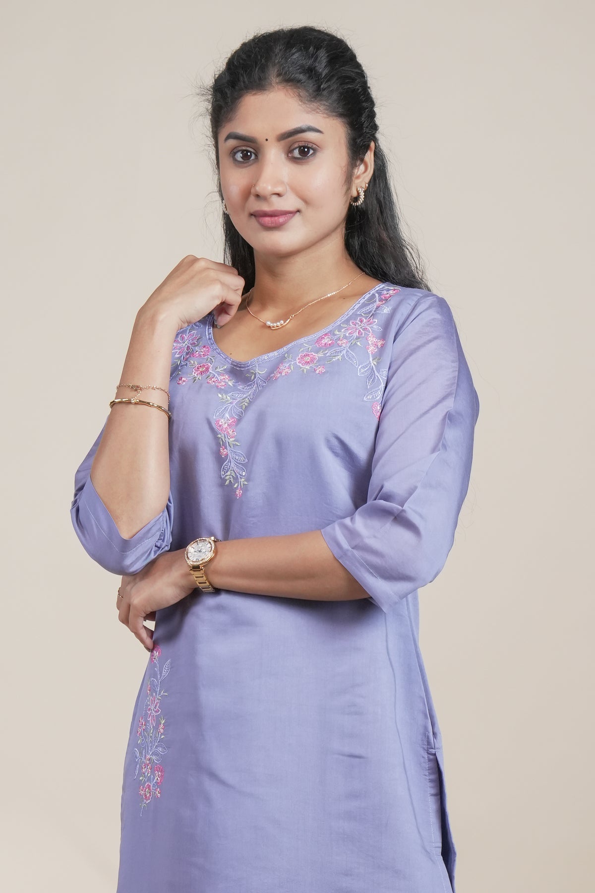 Purple floral designed straight cut kurta set with 3/4 sleeve and a pant