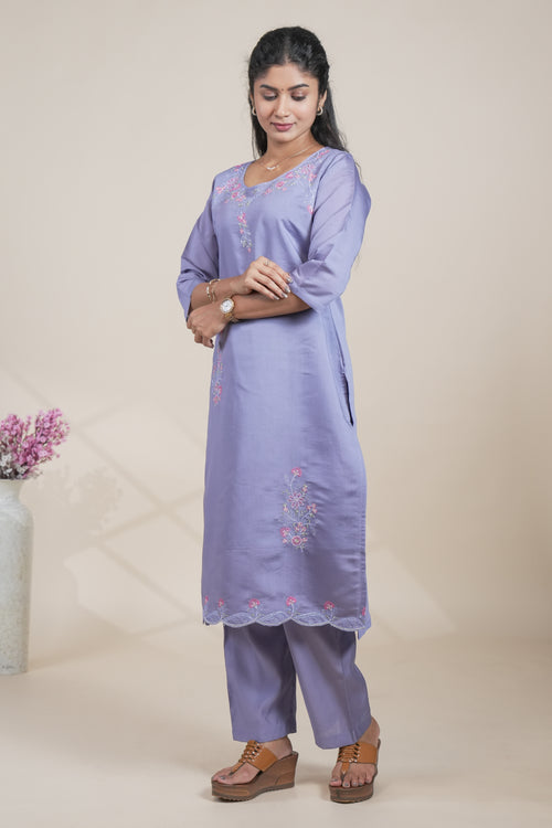 Purple floral designed straight cut kurta set with 3/4 sleeve and a pant