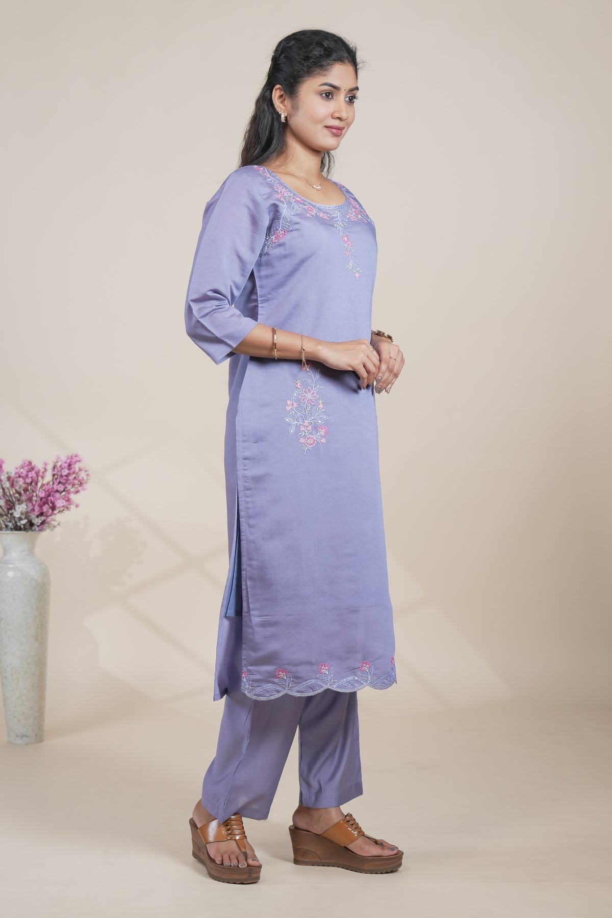 Purple floral designed straight cut kurta set with 3/4 sleeve and a pant